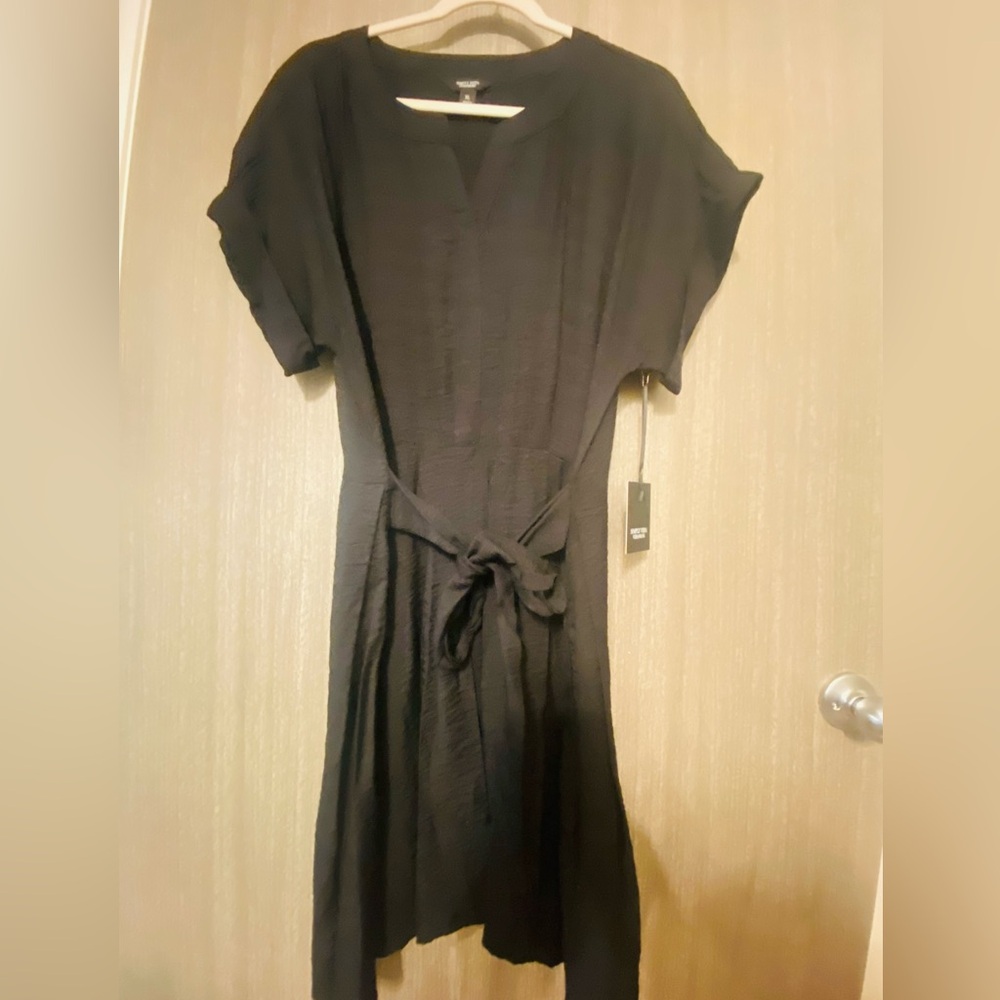 NWT women’s black knee length dress size XL.